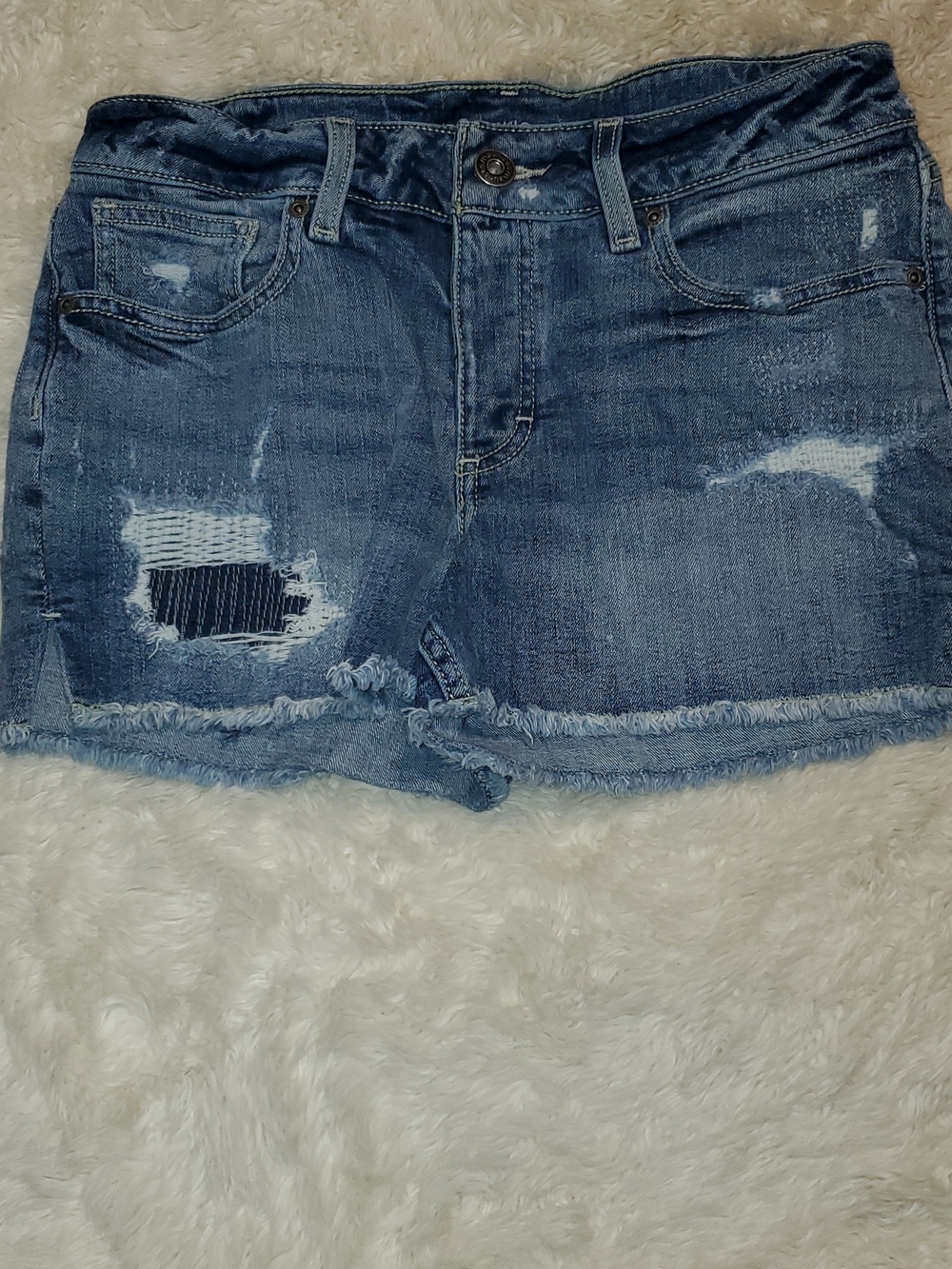 Maurices Blue Denim Mini Skirt with Subtle Distressing
